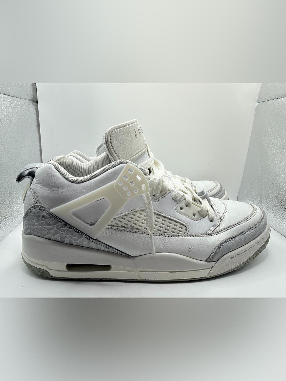 Jordan men’s White and Light Gray Retro Sneaker